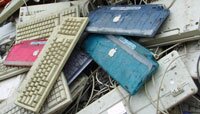 Apple keyboards in China e-waste dump