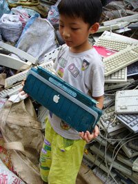 Apple keyboards in China e-waste dump