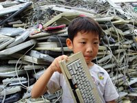 Apple keyboards in China e-waste dump